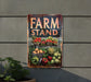 a sign that says farm stand on it