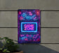 a neon sign on the side of a building