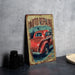 a picture of an old red car on a table