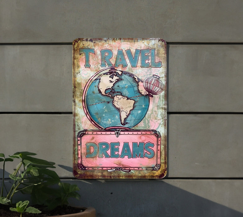 a sign on the side of a building that says travel dreams