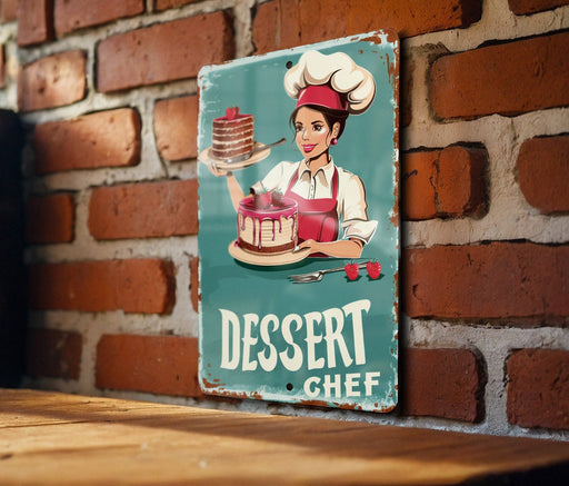 a sign on a brick wall that says dessert chef