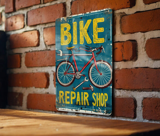 a bicycle repair shop sign on a brick wall