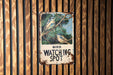 a bird watching spot sign on a wooden wall