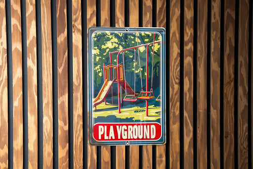 a picture of a playground sign on a wooden wall