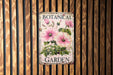 a sign on a wooden wall that says botanical garden