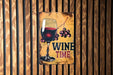 a sign with a glass of wine on it