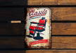 an old tin sign advertising a barbershop