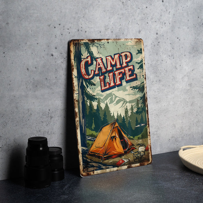 a sign that says camp life next to a cup of coffee