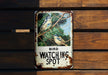 a bird watching spot sign on a wooden wall