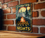 a picture of a campfire sign on a brick wall