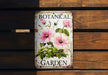 a bottle of botanical garden sitting on top of a wooden bench