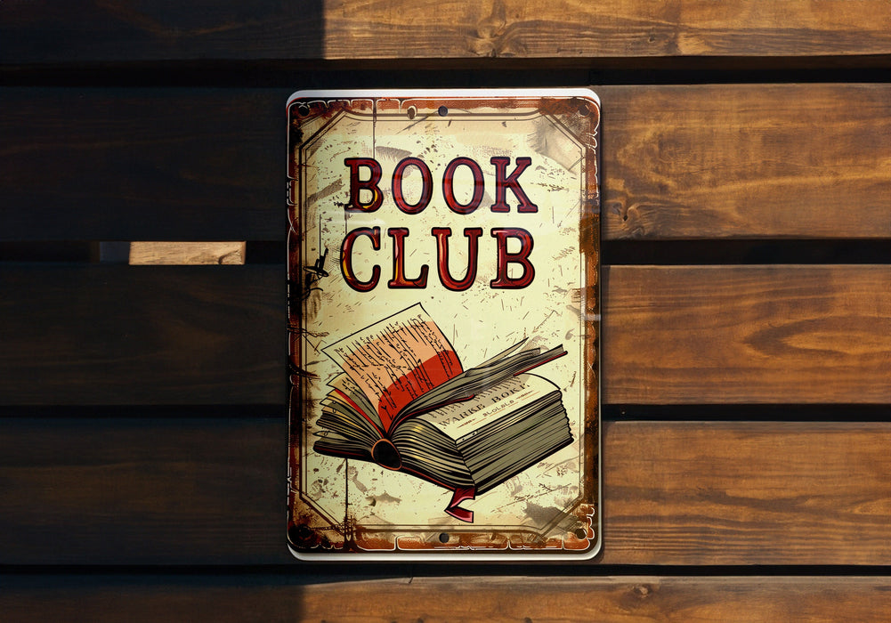 a book club sign hanging on a wooden wall