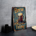 a beer sign sitting on top of a table