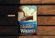 a sign on a wooden wall that says nordic waters