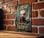 a sign on a brick wall that says brew home