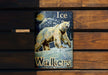 a picture of a polar bear on a wooden bench