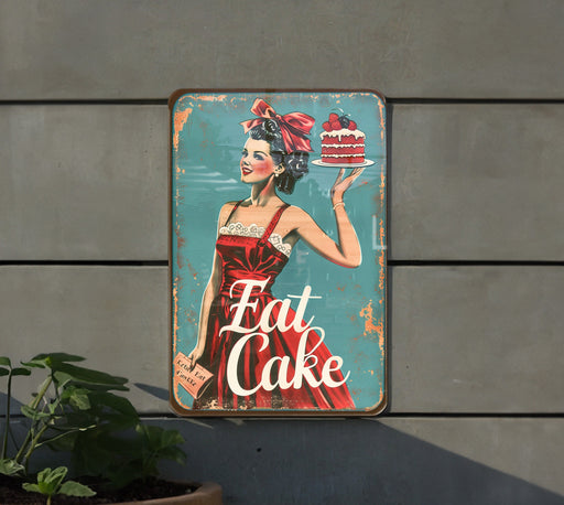 a metal sign with a woman holding a cake