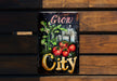 a sign that says grow city on it