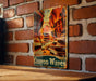 a picture of a canyon waves sign on a brick wall