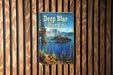 a sign on a wooden wall that says deep blue wonder