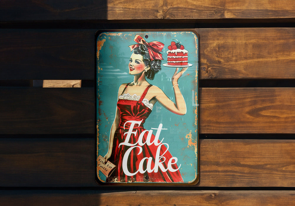 a metal sign with a woman holding a cake