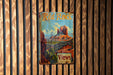 a sign on a wooden wall that says red rock views