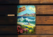a picture of a surf board on a wooden bench
