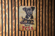 a sign on a wooden wall that says save pets