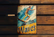 a sign on a wooden wall that says surf waves