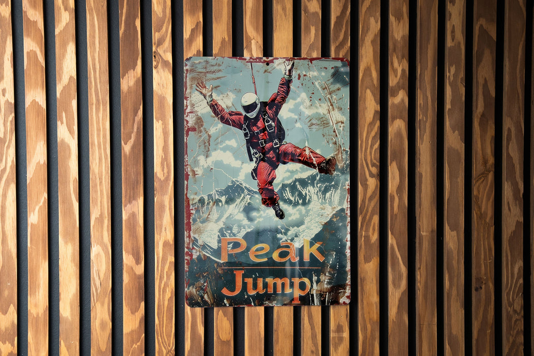a sign on a wall that says peak jump