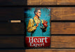a close up of a sign on a wooden wall