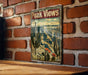 a sign on a brick wall that says peak views
