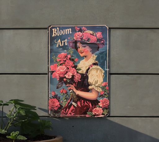 a picture of a woman with flowers on a wall