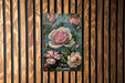 a painting of a pink rose on a wooden wall