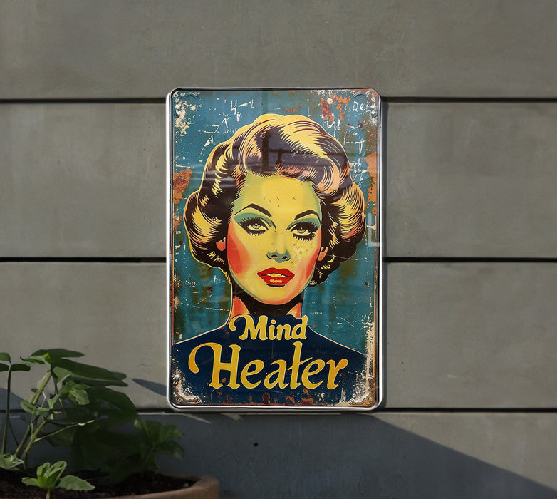 a metal sign with a woman's face on it
