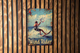 a picture of a man on a surfboard on a wall
