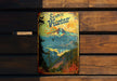 a wooden bench with a poster on it