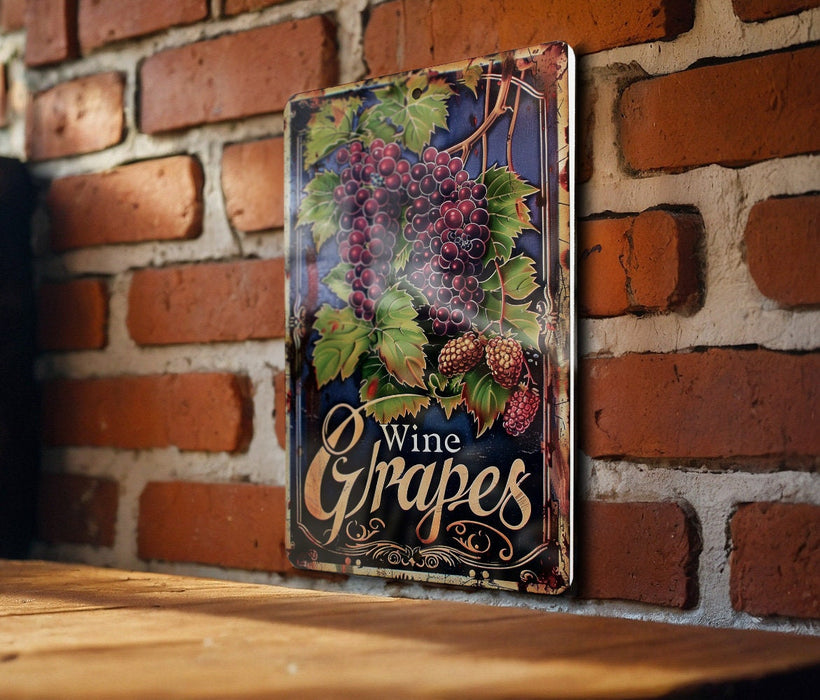a picture of grapes hanging on a brick wall