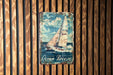 a sign on a wooden wall that says ocean breeze