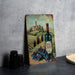 a painting of a bottle of wine next to a plate of grapes