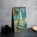 a picture of a sailboat on a table