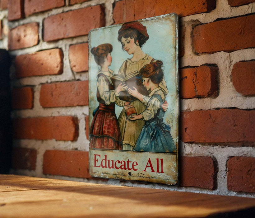 a picture of a woman reading a book on a brick wall