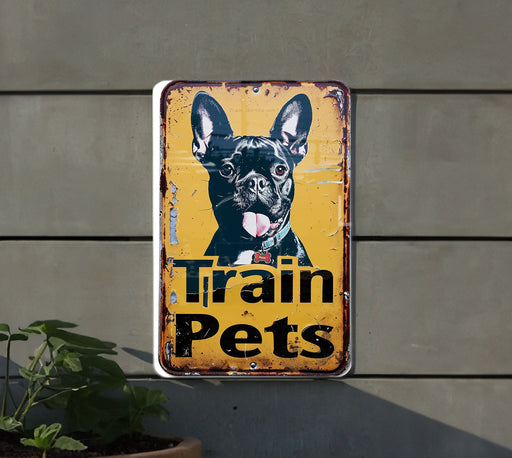 a sign that says train pets with a picture of a dog