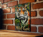 a picture of a tiger on a brick wall
