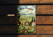 a wooden bench with a wine sign on it