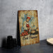 a painting of a cook cooking on a wooden sign