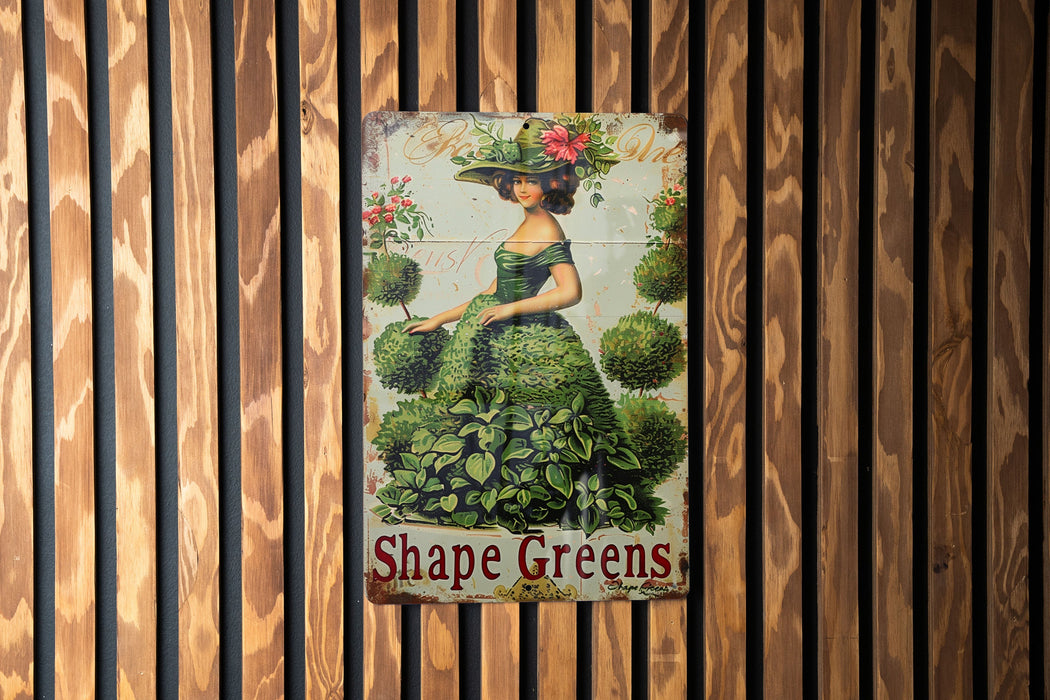 a picture of a woman in a green dress