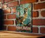 a picture of a deer on a brick wall