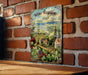 a picture of a wine region hanging on a brick wall