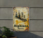 a sign on the side of a building that says highland spirits
